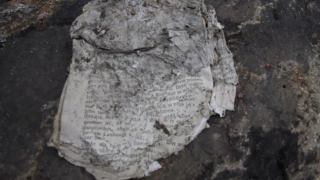 Remarkably well-preserved documents were also found at the site. Picture: Ruptly
