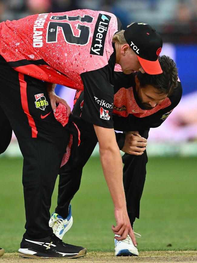 The water ruined the pitch and the clash. (Photo by Quinn Rooney/Getty Images)