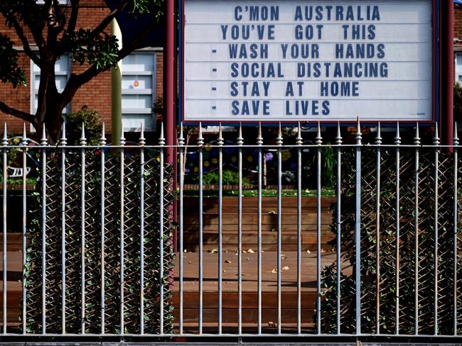 A sign with tips to fight the coronavirus at a school at Observatory Hill in Sydney. Picture: AAP