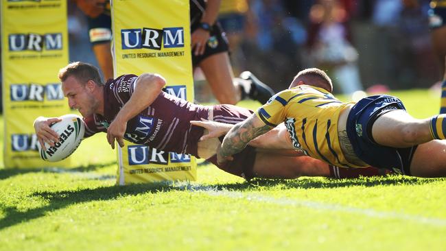 Manly's Daly Cherry-Evans scores a try during his side’s romping win over Parramatta. Picture: Phil Hillyard