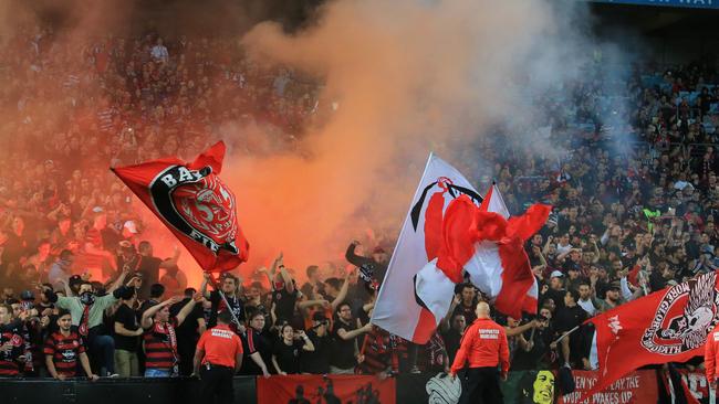 A flare goes off in the RBB during the Western Sydney Wanderers derby against Sydney FC. Pic Mark Evans