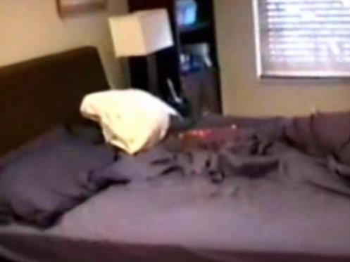 The footage shows a bed in Epstein's mansion.