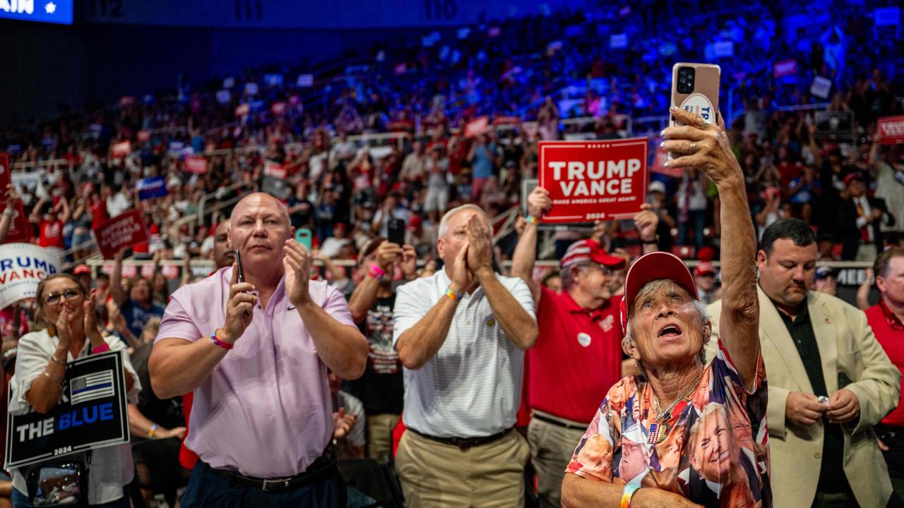 Attendees cheer as Donald Trump speaks during his campaign rally on July 24, 2024. Picture: Brandon Bell/Getty Images North America/Getty Images via AFP