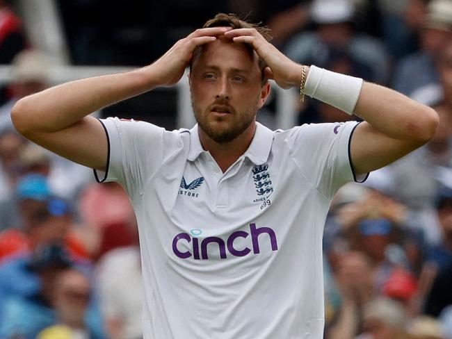 England's Ollie Robinson reacts on day one of the second Ashes cricket Test match between England and Australia at Lord's cricket ground in London, on June 28, 2023. (Photo by Ian Kington / AFP) / RESTRICTED TO EDITORIAL USE. NO ASSOCIATION WITH DIRECT COMPETITOR OF SPONSOR, PARTNER, OR SUPPLIER OF THE ECB