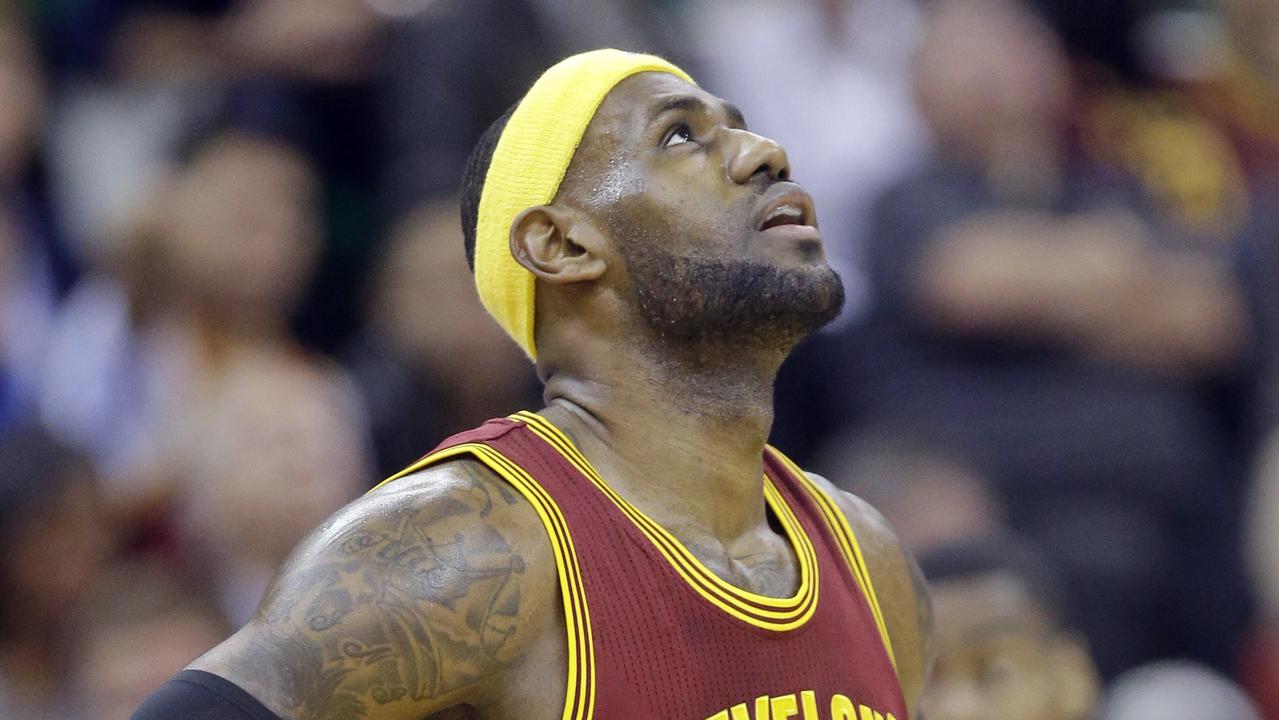 Cleveland Cavaliers' LeBron James (23) looks at the scoreboard in the second quarter during an NBA basketball game against the Utah Jazz, Wednesday, Nov. 5, 2014, in Salt Lake City. (AP Photo/Rick Bowmer)