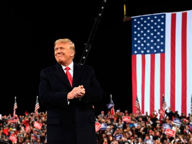 US President Donald Trump greets supporters at Valdosta Regional Airport in Valdosta, Georgia. Picture: AFP