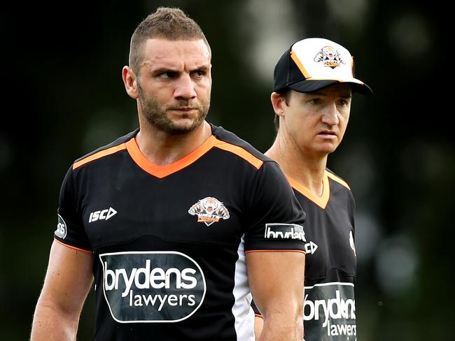 Robbie Farah and Tigers coach Jason Taylor during a pre-season training session. Picture: Gregg Porteous