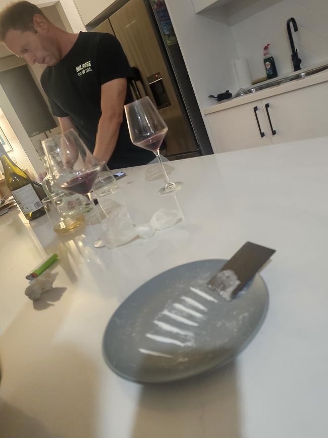 David Speirs in his kitchen with lines of white powder.