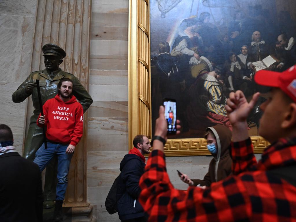 Supporters of US President Donald Trump enter the US Capitol's Rotunda. Picture: AFP