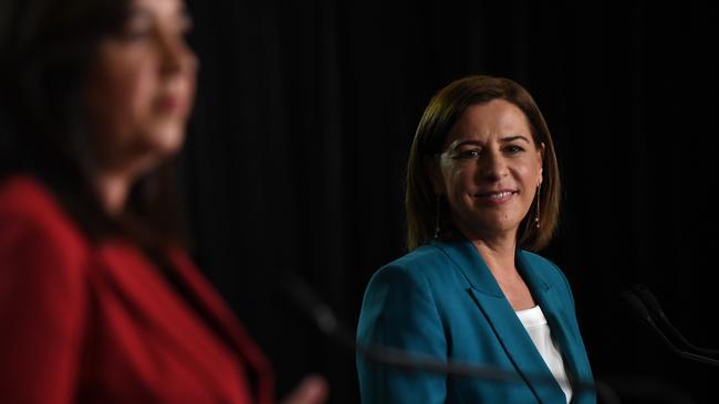 BRISBANE, AUSTRALIA - NewsWire Photos - OCTOBER 28, 2020. Queensland Premier Annastacia Palaszczuk (left) and opposition Leader Deb Frecklington engage in a debate during the Sky News - Courier Mail People's Forum at the Broncos Leagues club in Brisbane, ahead of the October 31 state election. Picture: NCA NewsWire / Dan Peled