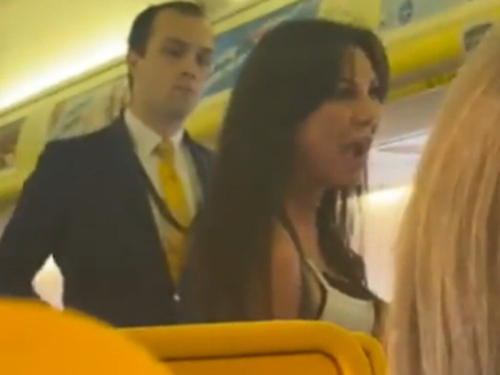 A passenger managed to film the woman hurling abuse at the Ryanair crew members. Picture: Twitter
