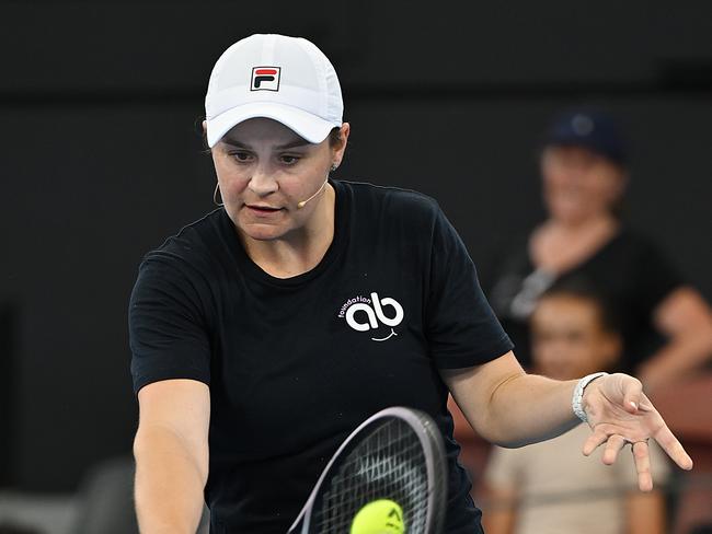 29/12/2024: Ash Barty and Pat Rafter play doubles  during the Charity Showcase, Pat Rafter Arena, during the Brisbane International Tennis Tournament, Brisbane. pic: Lyndon Mechielsen/Courier Mail