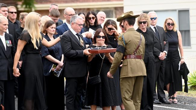 Former Defence Minister Joel Fitzgibbon and his family were presented his son’s medals Picture: NCA NewsWire / Jeremy Piper