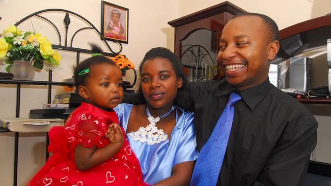 Muhama Yotham with wife Margaret and their daughter Grace, then aged 2, back in 2009.