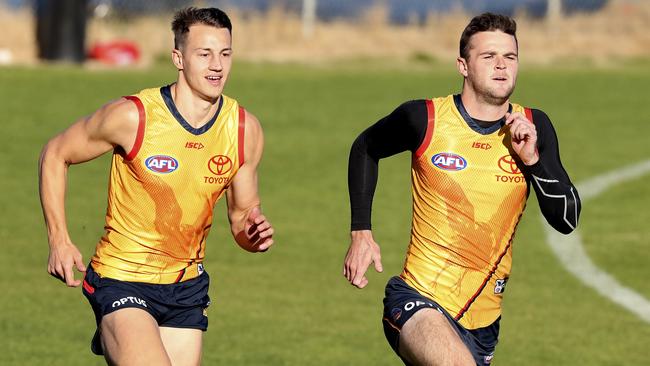 Tom Doedee (left) is expected to miss Adelaide’s clash against North Melbourne. Picture: Sarah Reed