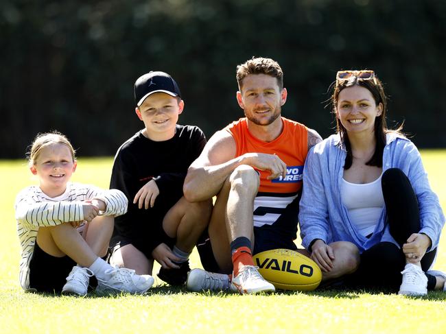 Lloyd with his wife Crystal, and kids Charli and Parker, after announcing his retirement. Picture: Phil Hillyard