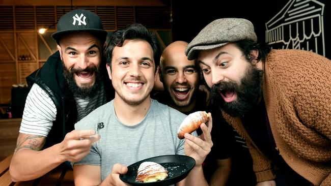 Abbots &amp; Kinney owner Jonny Pisanelli (centre)and his staff Damien Di Mella, Rocky Oliveira and Nicholas Cioffi show off their famous sfogliatelle pastries. Picture Mark Brake