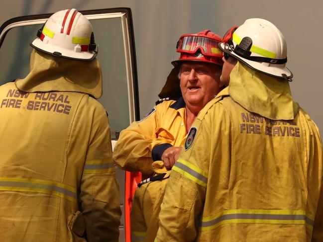 Firefighters battle bushfires in Busbys Flat, northern NSW, Wednesday, October 9, 2019. (AAP Image/Jason O'Brien) NO ARCHIVING