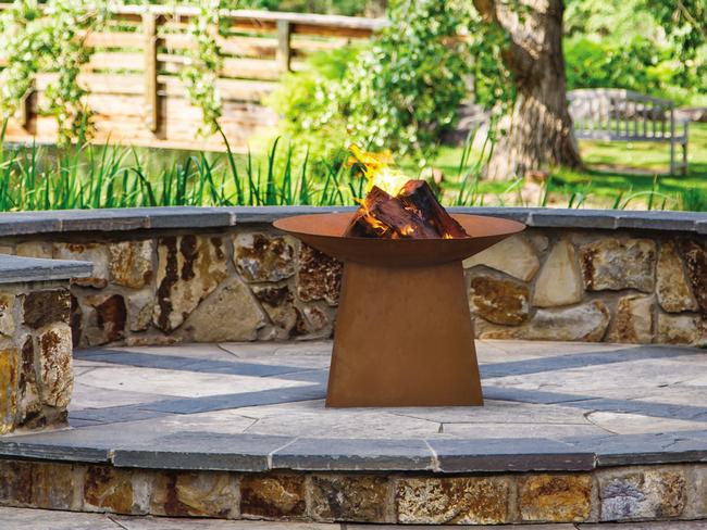 HOME DECORATE WINTER ALFRESCO Aurora rustic firepit with Oxidised steel bowl and base. The elevated design suits standing  entertaining. Easy to assemble, $239 from Bunnings, bunnings.com.au