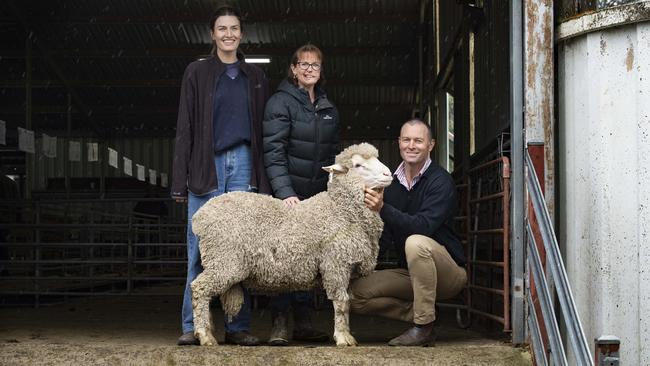 Two joint ram toppers realised a top-price of $10,500 at the Toland Poll Merino ram sale. Here is buyer Edwina Sleigh, left, from Ruffy with Toland owners Anna Toland and Simon Riddle with one of the two top price rams. Picture: Zoe Phillips.