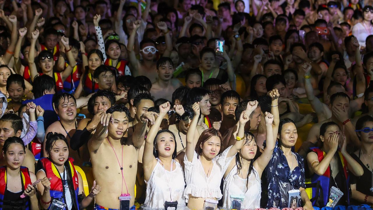 The Wuhan Maya Beach Water Park was filled with partygoers over the weekend as it hosted an electronic music festival, with little sign of social distancing or mask-wearing. Picture: STR/AFP