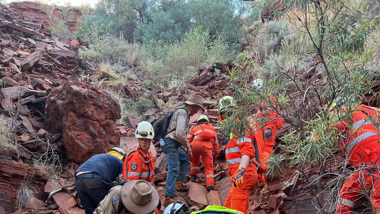 The rescue team took seven hours to locate and carry the 36-year-old-woman out of one of the steepest gorges in Western Australia. Picture: DFES WA