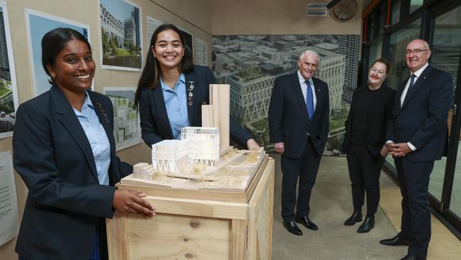 Macarthur Girls' High School students Clodia Stanislaus, 16 and Leila Fonua, 16, with Lang Walker, Lisa Havilah and Western Sydney University vice chancellor Barney Glover. Picture: Justin Lloyd