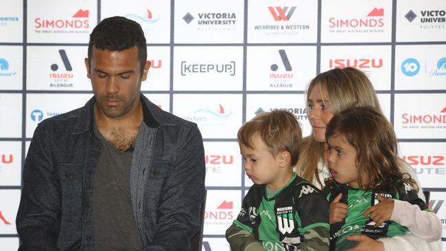 Nikolai Topor-Stanley sits with his wife Kylie, and children Luna and Remy as he announces his retirement. Picture: Robert Cianflone/Getty Images