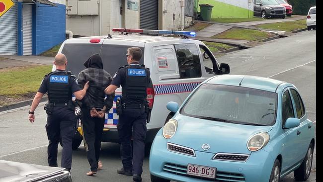 Police arrest man after car rollover closes street in Labrador. Photo: Charlton Hart