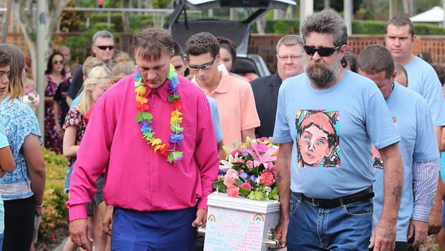 Blake Unsworth (left) and family members carry the coffin of his 12-year-old son Tyrone, who committed suicide after being the victim of homophobic bullying. (Pic: Jack Tran)