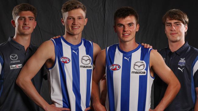 MELBOURNE , AUSTRALIA. November 20, 2023. AFL Draft at Marvel Stadium .  Number 4 pick Zane Duursma (left) and Number 2 pick Colby McKercher  (right) with Harry Sheezel and George Wardlaw . Pic: Michael Klein