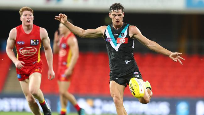 Connor Rozee gets a kick away in round one. Picture: Chris Hyde/Getty Images.