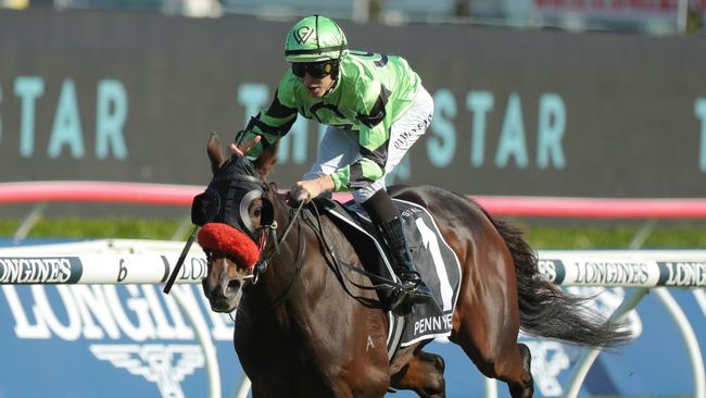 Damian Lane pilots Pennyweka to a commanding win in the Australian Oaks at Randwick on Saturday. Picture: Jeremy Ng/Getty Images