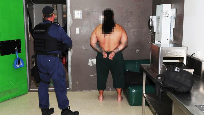 Officers from Security Operations Group (SOG) undertake a targeted covert contraband raid at Shortland Correctional Centre, Cessnock, on December 11 2021. Picture: Peter Lorimer