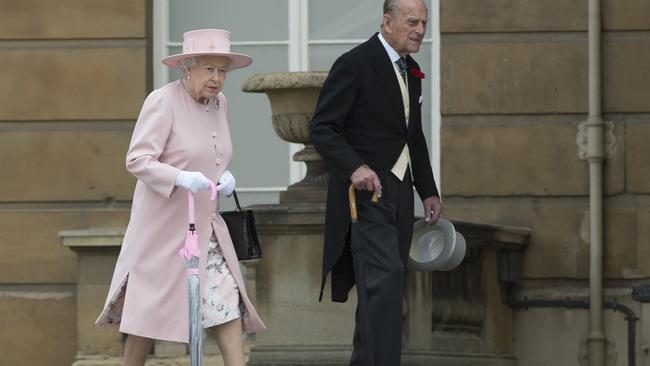 Queen Elizabeth II and Prince Phillip, Duke of Edinburgh at their garden party at Buckingham Palace on May 16, 2017 in London. Picture: Victoria Jones/Getty