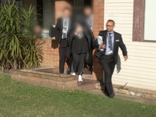 NSW Police arrest the 55-year-old woman at her home in Merrylands on Tuesday. Picture: NSW Police