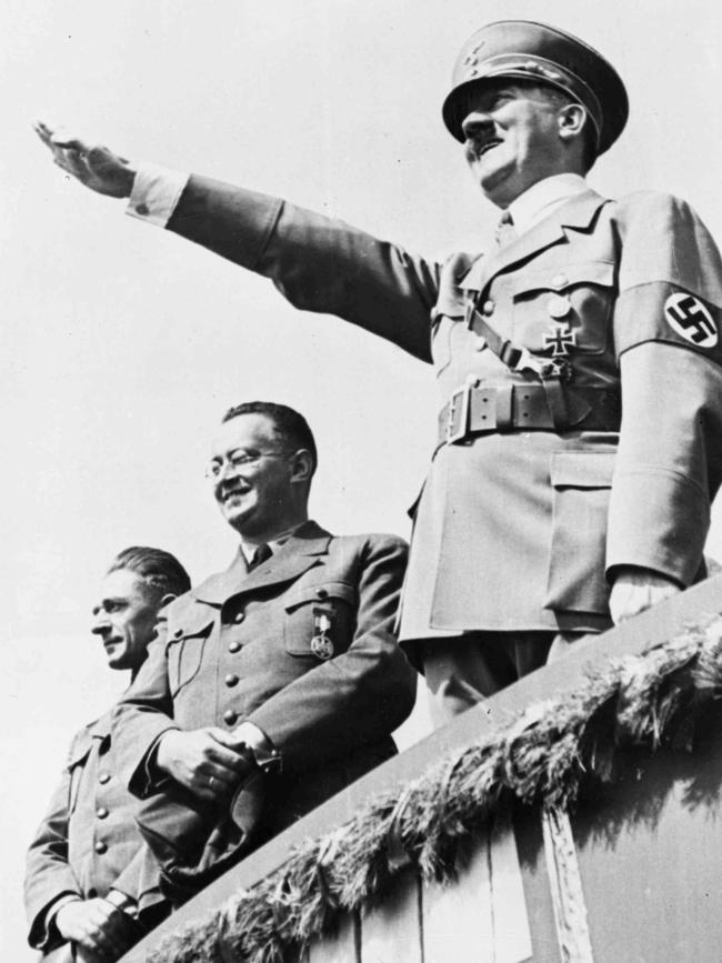 Adolf Hitler salutes a crowd in Breslau in 1938. Picture: AP