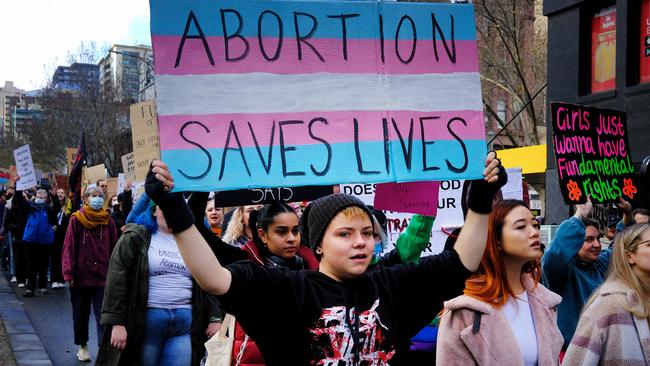 People are seen rallying in Melbourne to defend abortion rights. Picture: Luis Enrique Ascui