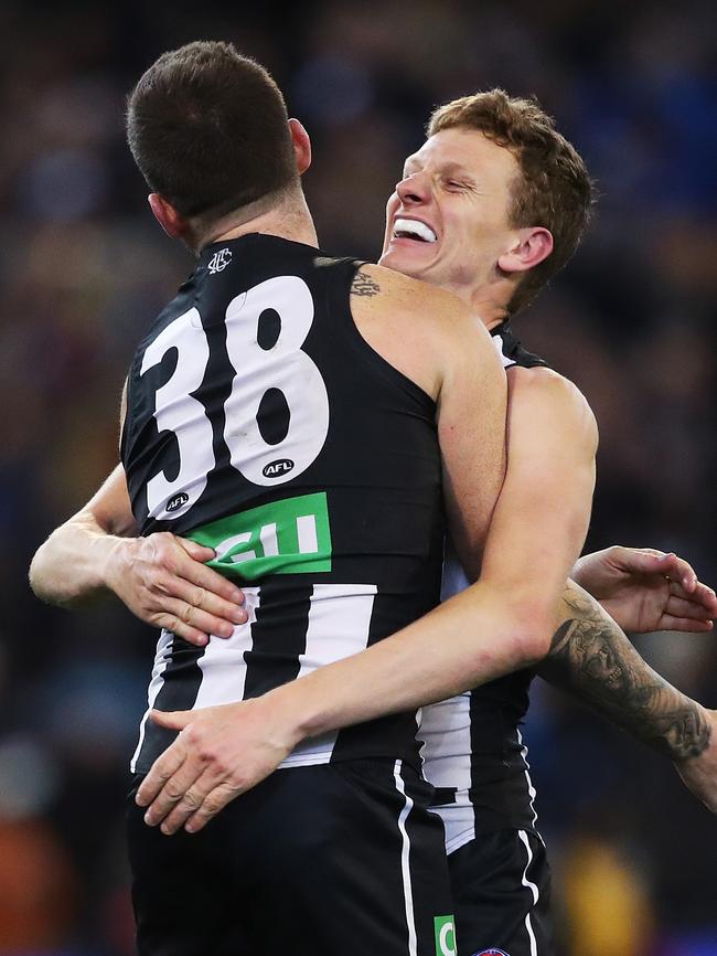 Collingwood's Will Hoskin-Elliott and Jeremy Howe after the win. Picture: Phil Hillyard