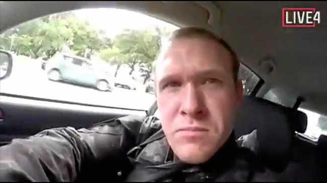 This image taken from the alleged shooters video, which was filmed Friday, March 15, 2019, shows him as he drives and he looks over to three guns on the passenger side of his vehicle in New Zealand. (AP Photo)