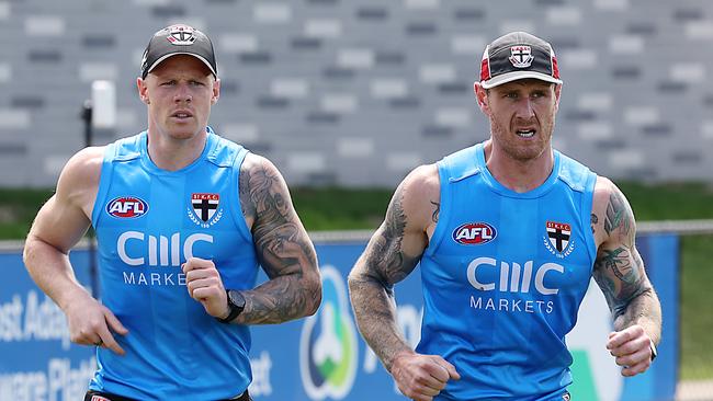 AFL. St Kilda training in hot conditions at Moorabbin. Zak Jones and Tim Membrey run laps. Picture: Ian Currie