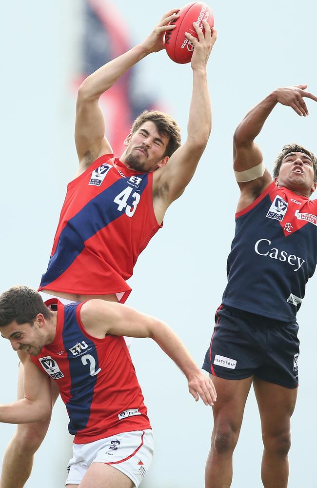 Harry Nolan marks for Coburg against Casey Demons.