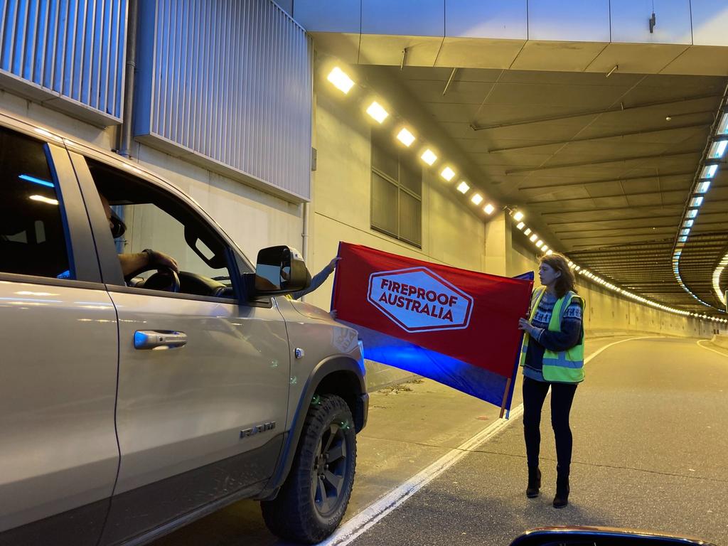 Fireproof Australia protesters blocking the Western Distributor between the Harbour Bridge and ANZAC Bridge today. Source: Facebook