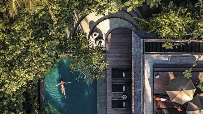 Bali’s luxe escapes are in a league of their own, offering a magical mix of barefoot luxury, nourishing food, and world-class wellness experiences for body, mind and soul. From epic surf holidays to yoga, hydrotherapy and sound healing, escape the grind at one of these beautiful boltholes.Best Bali hotel for: Surf fanaticsPekutatan, West coast BaliEffortlessly cool Lost Lindenberg is a design-lover’s paradise, raised high among lush coconut palms on Bali’s wild and untouched west coast.Start your stay at this sustainable, community-focussed boutique gem with a Balinese blessing, and then make a bee line for the spa, organic plant-based food, beach bonfires and, most importantly, epic surf.Lost Lindenberg has bragging rights to its own private beach and break, plus Bali’s longest wave – Medewi – is a short drive away.Room rates include surf sessions with local instructors at Lost Beach, plus free shuttles to other surfing hot spots.Find out more