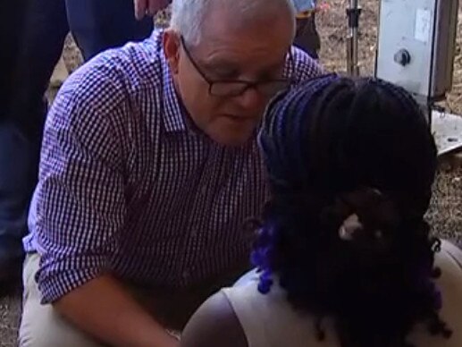 A woman in Rockhampton has thrown herself at Prime Minister Scott Morrison's feet and prayed for him to help her family in Africa. Source: 7 News https://twitter.com/jenbechwati/status/1389395113386807297?s=20