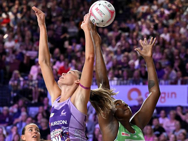 The Firebirds’ Isabelle Shearer (left) and the Fever’s Jhaniele Fowler-Nembhard challenge for the ball. (Photo by Bradley Kanaris/Getty Images)