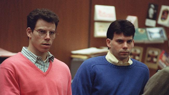 (FILES) Erik Menendez (L) and his brother Lyle (R) listen during a pre-trial hearing, on December 29, 1992 in Los Angeles after the two pleaded innocent in the August 1989 shotgun deaths of their wealthy parents, Jose and Mary Louise Menendez of Beverly Hills, California. Lyle and Erik Menendez, the two brothers whose grisly murder of their parents in their swanky Beverly Hills home gripped the United States and was the subject of a recent Netflix series, could be released from prison after Los Angeles' chief prosecutor said October 24 he would ask a judge to look again at their sentences. (Photo by VINCE BUCCI / GETTY IMAGES NORTH AMERICA / AFP)