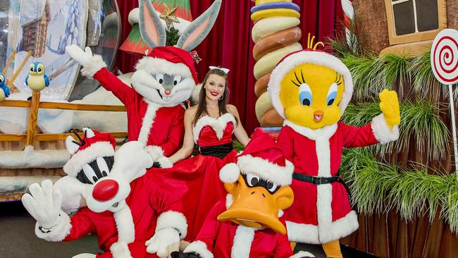 See you in Surfers Paradise soon? Vanessa Krummenacher is joined by Sylvester, Daffy Duck, Bugs Bunny and Tweety ahead of Movie World's White Christmas. Movie World operator Village Roadshow and Surfers Paradise Alliance are joining forces to cross-promote each other. Picture: Jerad Williams