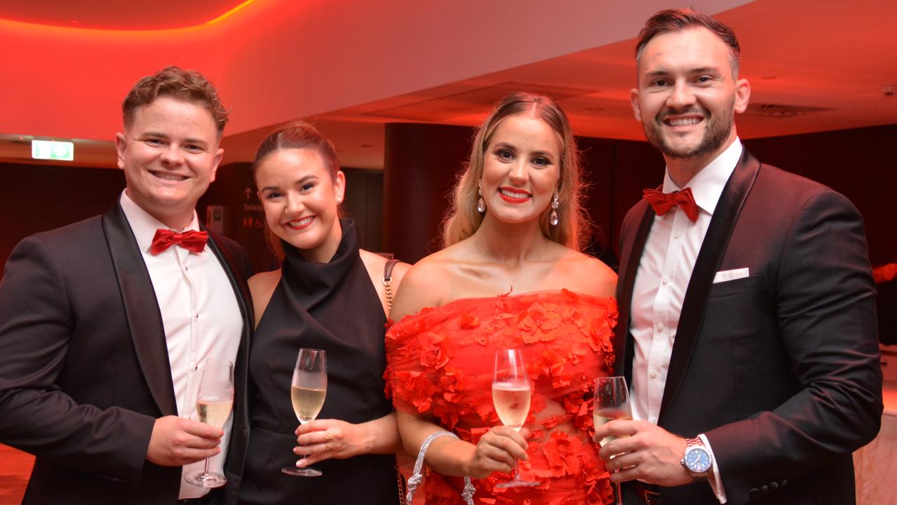 he 2024 FNQ Salvos Champs Ruby Ball at Cairns Convention Centre: Jamie Lineburg, Leah Carter, Kate George and David Murphy, who was auctioneer for the charity auction at the event. Picture: Bronwyn Farr