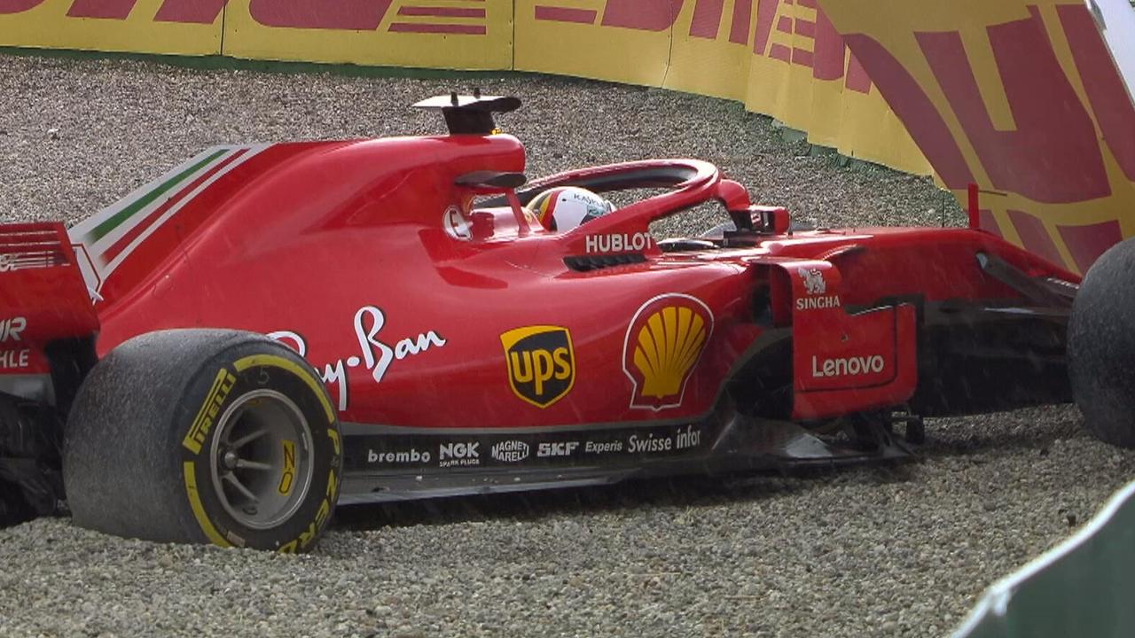 Sebastian Vettel crashes out of the lead of the German GP.